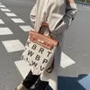 Grote capaciteit nieuwe aankomst Koreaanse unisvas schoudertas met uniek ontwerp- en alfabetpatroon canvas tas ontwerpen canvas tassen met handgrepen