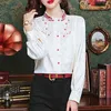 Blouses feminina Mulheres moda moda vintage estilo bordado de bordado camisetas elegantes chic stand colar tops de manga longa feminina de manga longa