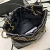 Klasyczny designerski skórzany łańcuch torba Mini Bin Bin Bag w torbie lustra Jakość damskiej torby na ramię metalową odznakę cekiny designerskie torby z pudełkiem 20 cm CHD230925