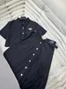 Tvådelad kläddesigner 2024 Spring/Summer Triangle Label Top Coat Slim Fit Midjeband Half kjol Set Two Pieces 6kd1