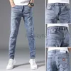 Mäns jeans Vår/sommar Nya herrar Jeans Youth Slim Fit Small Feet Pants Men's Trendy Casual Elastic Large Size Denim Plus Size Pants