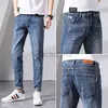 Jeans masculin printemps jeans masculins pour les pieds élastiques pantalon pantalon en denim masculin et pantalon de taille plus