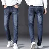Heren jeans 2022 lente en herfst nieuwe herenjeans Koreaanse editie slanke fit elastische kleine rechte buis ademende heren denim broek plus size broek