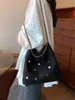Bolsa de sacola bolsa de designer saco feminino bolsa de bolsa de compras de saco de praia famosa famosa de palha de palha de alta qualidade bolsa de ombro 003