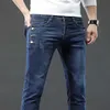 Jeans pour hommes de la mode rétro pour hommes en jeans Snowflake lavage coréen pantalon élastique pour hommes classiques