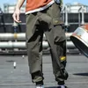 Spodnie męskie Nowe spodnie odzieży roboczej Spodnie Polityjskie Hip-Hop Hits Kolorowe multi kieszeni spodnie uliczne bluza sportowa 2404
