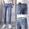 メンズジーンズ2022スプリングニューメンズジーンズ韓国版スリムフィットエラスティックフィートパンツメンズ通気性デニムパンツプラスサイズパンツ