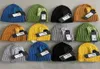 Berretti di designer in Europa extra sottili cappelli di utilità in lana merino un logo lente in occhia