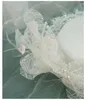 Berets 2024 Elegant Party Fancy Show Mini White Wedding Hat Mesh Floppy Brim Pearls Bow Fascinator Lace Satin Fedora Cap Headdress