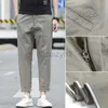 Męskie dżinsy Summer Nowe stałe kolory swobodne spodnie dla męskich przycięte splasy z prostymi nogami