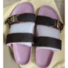 2024 Sandálias de designer Brand Women Slippers Sandal Fashion Room Sapatos femininos praia casual Soled grossa Black Shoemaker Slide de luxo 35-45