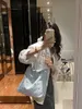 Bolsa de sacola bolsa de designer saco feminino bolsa de bolsa de compras de saco de praia famosa famosa de palha de palha de alta qualidade bolsa de ombro 003