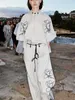 Mujeres Sets Cody Linen Stand Collar Manga Flower Flower Tops Pantalones de pierna ancha Carga de vacaciones 240426