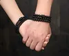 Kralen 10/12mm Natuurlijke zwarte obsidiaan Gewerkte Boeddha Lucky Amulet Circulaire Bead String armband Geschikt voor vrouwelijke mannen sieraden en nieuwjaarscadeaus