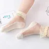 Chaussettes pour enfants Nouveaux bébés été filles enfants en mailles de la mode à volants à volant à frouillère