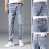 Mäns jeans Vår/sommar Nya herrar Jeans Youth Slim Fit Small Feet Pants Men's Trendy Casual Elastic Large Size Denim Plus Size Pants
