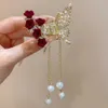 Haarclips Bronrettes Butterfly Tassel Pearl Hair Claw Red Flower Festival Haarspeld voor meisjes paardenstaart Hair Clips Crab Women Fashion Accessoires Geschenken 240426