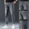 Jeans masculins créateurs masculins de créateurs coréens de mode de mode coréenne pour hommes élastiques élastiques jeunes ultra minces jeans serrés noir pantl244