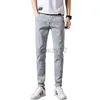 Jeans masculin printemps jeans masculins pour les pieds élastiques pantalon pantalon en denim masculin et pantalon de taille plus