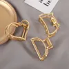 Hårklämmor Barrettes 2023 Fashion Hollow Metal Clip Simple Small Size Gold Geometric Armband Hink Shaped Womens Daily Daily