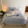 Bedding Sets 2024 Light Light Luxury Luxury Luxury Algodão de longo algodão Conjunto de quatro peças Pure Bordado Bordado Azul Pink