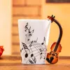240 ml creatieve muziek keramische mug gitaar vioolstijl schattige koffie thee melkstaaf mokken en kopjes met handvat nieuwheidsgeschenken 240422