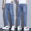 Jeans masculinos nuevos jeans delgados para hombres para la primavera y el verano, versión de jeans casual de jeans casuales