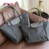 Najlepsze designerskie torba damska Tote na ramię w stylu europejskim wypoczynek torba nylonowa torebka crossbody składana haft haftowe zakupy mini 9025ess