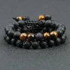 Bracciale bulbo oculare affascinante di tigre in pietra di lava nera per con perline per tessitura di gioielli regolabili fatti a mano da uomo Pulseira