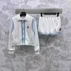 Pantaloni da donna a due pezzi designer 24 a nastro primaverile contrasto ricamato a flip flip collare con cerniera+pantaloncini casual set per donne 388n