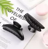 12pcs Clips de cheveux tenant les outils de style griffes de cheveux Cramps Care Hairpins Pro Salon Fix Hair Hairdressing Tool Black Color3939352