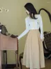 Sukienki robocze w stylu preppy kobiety róża dzianina sweter top wysoki talia długa faldas femme koreańska moda lady spódnice 2pcs set