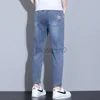 Jeans masculinos nuevos jeans delgados para hombres para la primavera y el verano, versión de jeans casual de jeans casuales