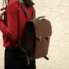 Okul çantaları retro deri kadınlar sırt çantası İngiliz kolej sırt çantaları büyük kapasiteli inek derisi bayan çantası 13 inç bilgisayar 2024
