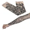 Trasferimento di tatuaggi 1 ~ 10 pezzi FINUS TATTOO TATTOO TATTOO TATTOLI FULL SLIT ON ARM KIT manica da tatuaggio da tatuaggio da uomo elastico guanto in nylon tatuaggi neri 240427