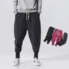 Pantalon masculin pantalon de coton hip hop pour hommes pour hommes saliers de rue élastique joggers nouveaux pantalons d'entrejambe de poche.