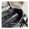 Spanish Niche Design Nylon Large Capacity Tote Bag Luxury Handbag for Mens Crossbody Bag Trendy Commuting Outdoor Leisure Womens Shoulder Bag
