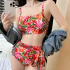 Nuova moda femminile semplice stile imbrattato a slitta nord -est grande fiore sexy spiaggia calda primavera costume da bagno