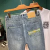 Herren Jeans Neue Herren Jeans Knöchel Länge modische gestickte Taschen bedruckte lässige Kleidung Lose Vintage Denim Street Q240427