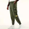 Men's Pants Classic design multi flap pocket cargo jogging pants mens loose fit suitable for dragging harem cargo jogging pantsL2404