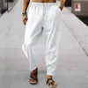 Pantalon masculin masculin Hip-hop en lin de coton respirant pantalon de marchandise à rayures décontractée lâche neuf points pantl2404