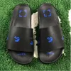 Luxus Gummi -Sohle -Streifen vor Sandalen berühmte Designerinnen Frauen Pantoffern Mann Slides Mode Sandale Sliders flacher Boden Flip Flop Flip Flop Strand Sandalen