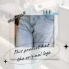 Kvinnors jeans designer designer lyxig hög vit för män nya koreanska mode stretch män lösa små raka rör mångsidiga byxor miui väska 641
