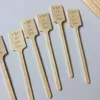 Décoration de fête 50pcs Laissez l'amour pousser gravé en bois en bois agitateurs d'agitateurs de mariage douche nuptiale favorables