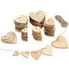 Décoration de fête (100pcs / lot) Un trou un trou en bois inachevé en bois Clé Couche de découpe favorise en bois des étiquettes d'amour de mariage en bois peints