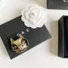 Boutique Broche de marque de broche en or 18K NOUVEAU CAT CHAT CHELD FORMABLE GIRMING GIRMIN