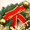 装飾花の小さなベルの花の飾り付きクリスマスの花輪クリスマスの木のドアホームパーティーの壁の暖炉のために花輪を吊るす