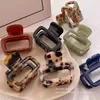 Hårklämmor Barrettes Nya retro ihåliga acetat Grab Clip Elegant Korean Crab Ponytail Braid Grab Clip Accessories for Girls Jewelry Gifts 240426