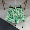 شورتات الدنيم المطبوعة غير النظامية الخضراء لفساتين النساء الصيفية النسائية الجديدة ذات الصصر الجديد ذي الخصر على الساق الساخنة على الساق