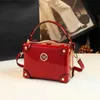 Bag mini 2024 Модный и роскошный дизайн с маленькой толпой женской коробкой Crossbody Lacquer кожаная сумочка